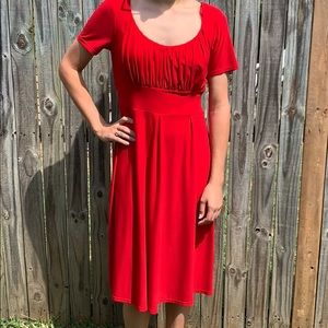 Pleated red dress ties in back